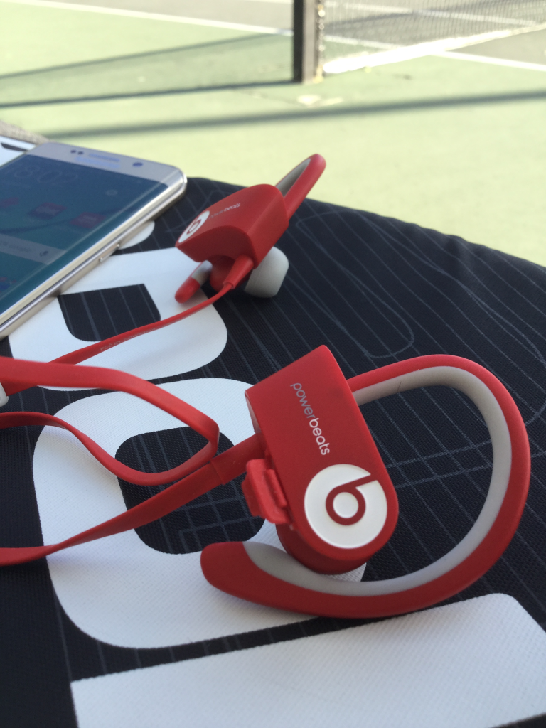 Beats Powerbeats2 Wireless with Samsung Galaxy S6 Edge on Babolat Tennis bag at California High Tennis Court