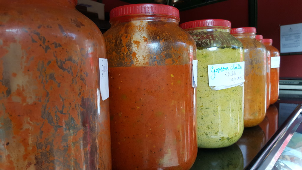 India chilli sauce jars at restaurant between Mysore and Bangalore